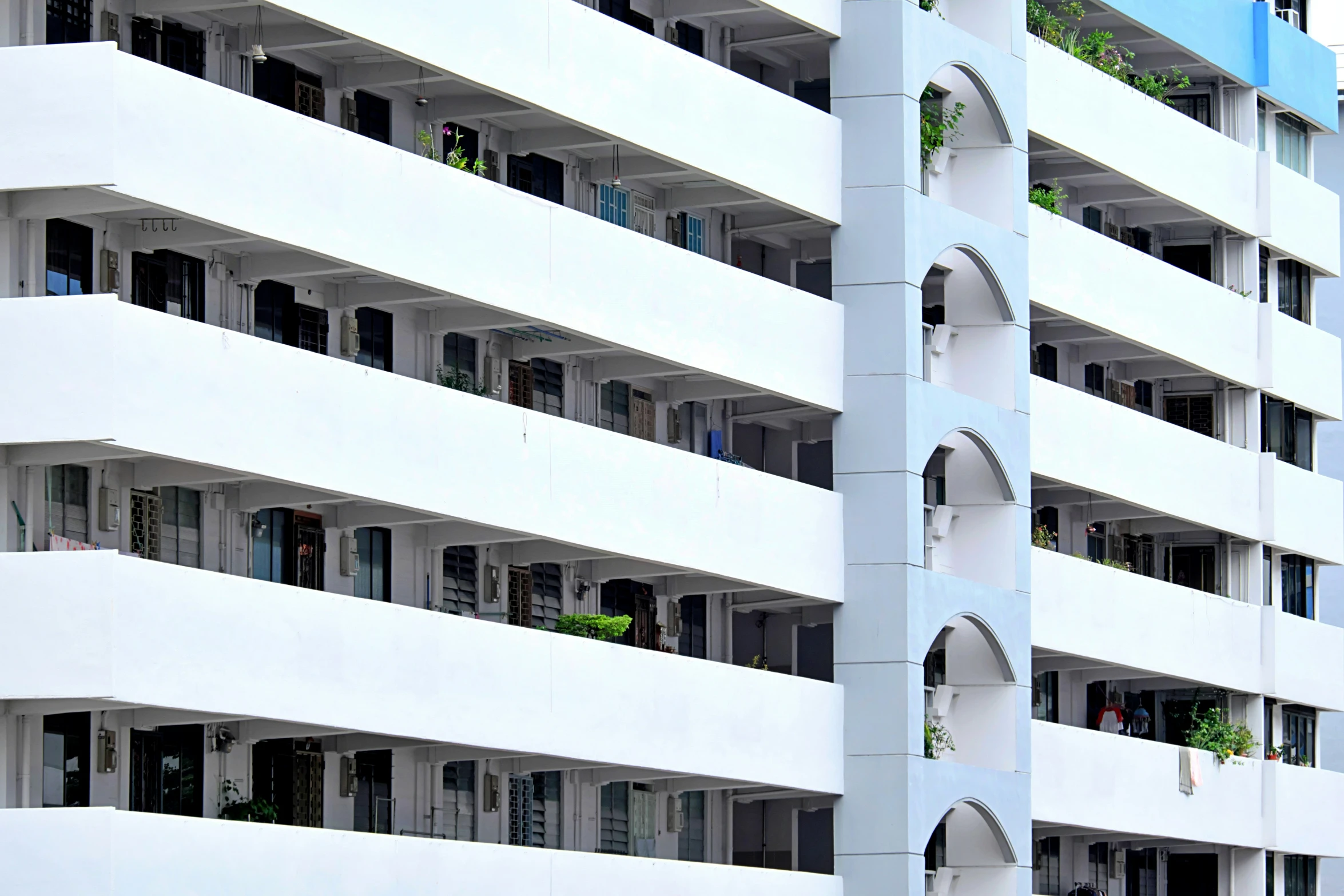 a big white building with a tall window