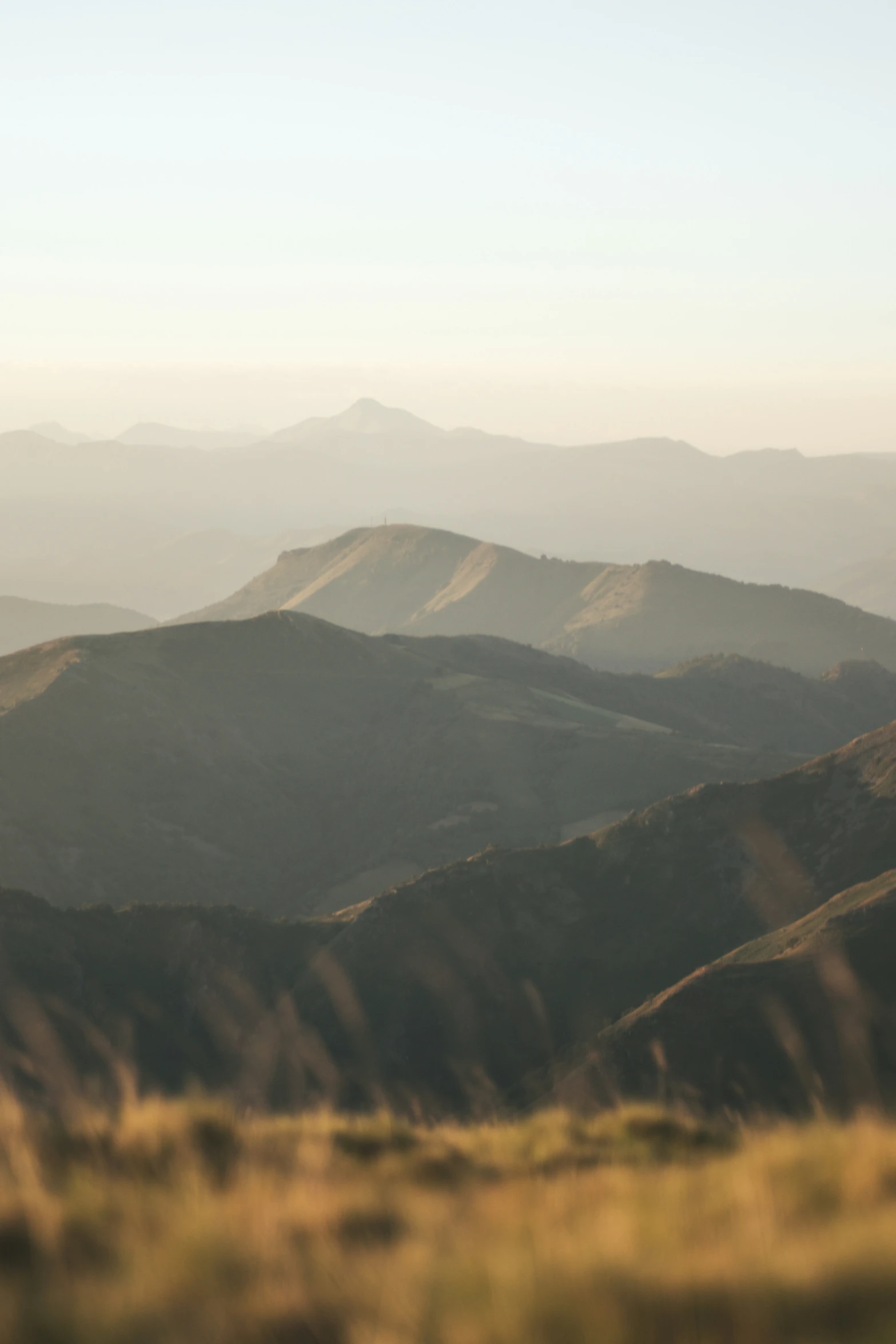 several mountains are seen in this blurry pograph