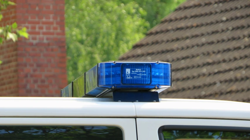 a white truck with its lights on at night