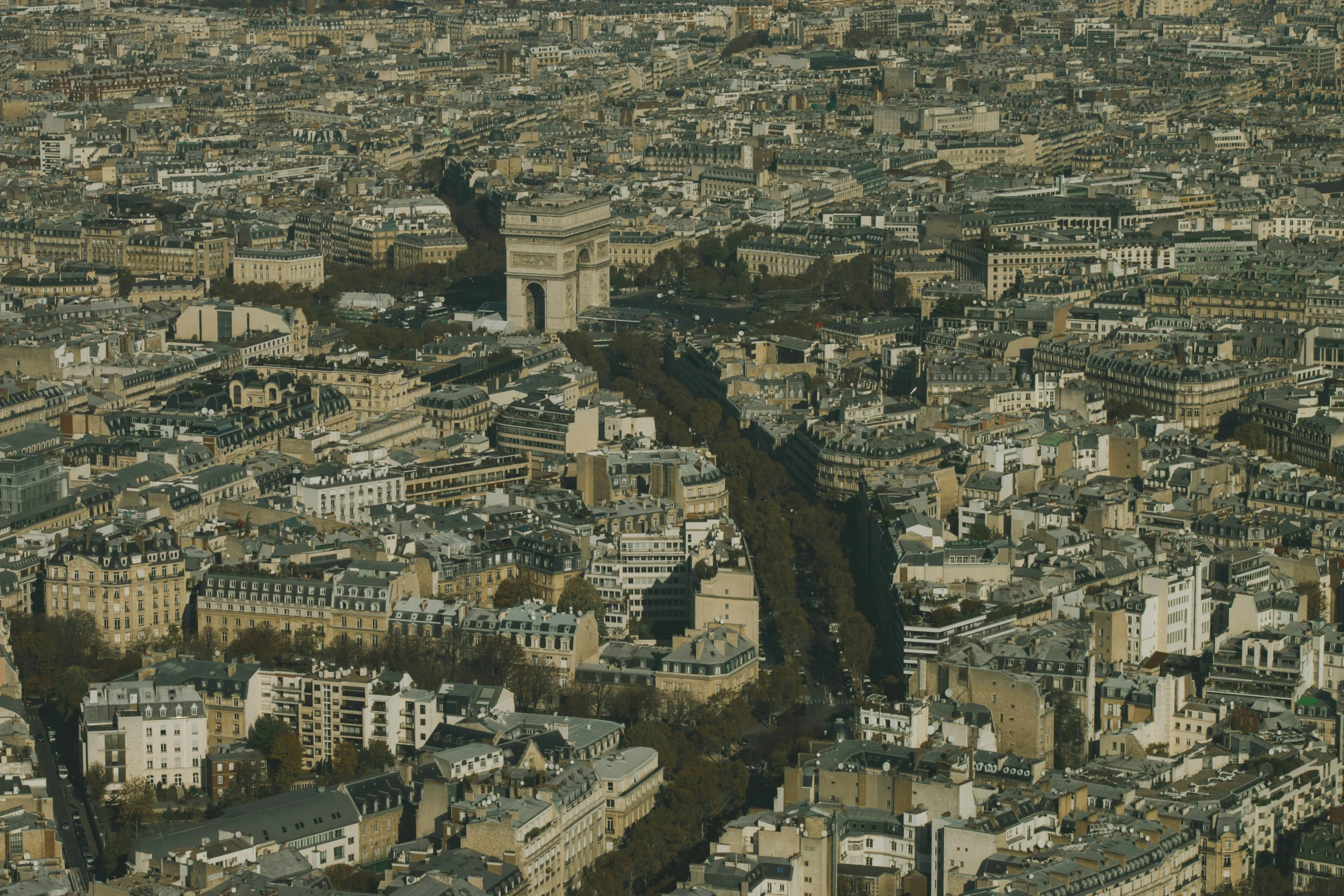 a cityscape is shown with many tall buildings