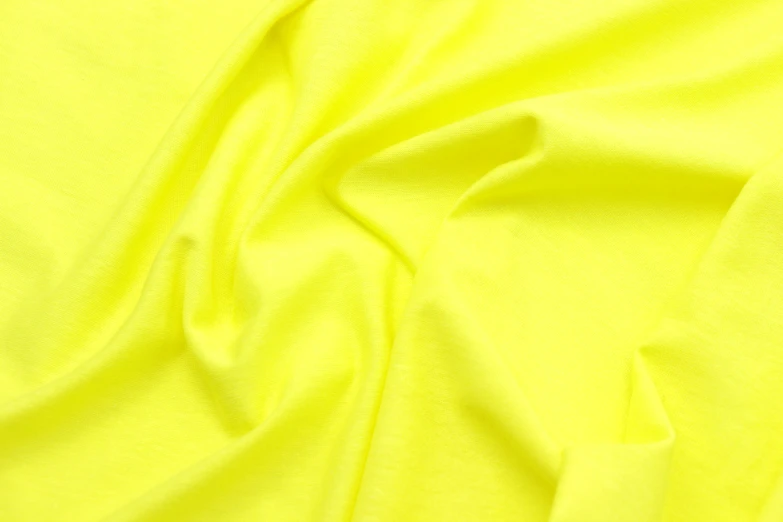 a plain yellow fabric textured with a thin design