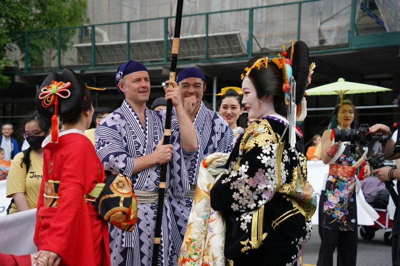 a group of people in costume standing near each other