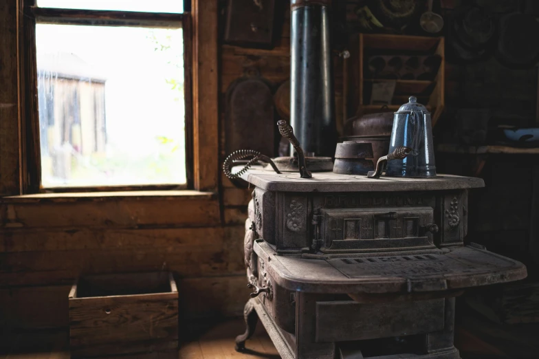 an old fashioned stove in a rustic kitchen