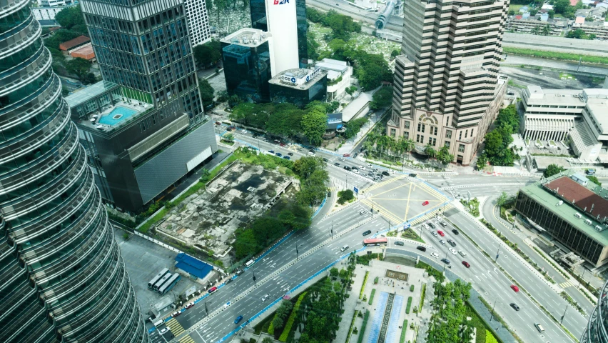 an aerial s of a busy city street and roadway intersection