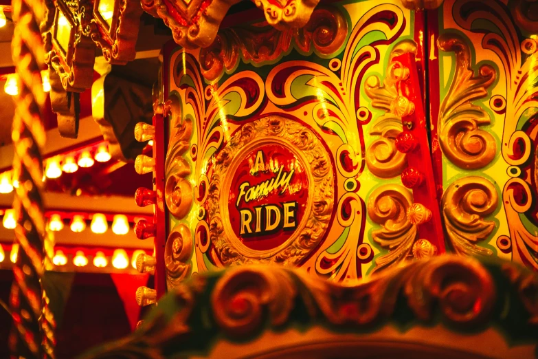 illuminated merry go round ride with lights in front