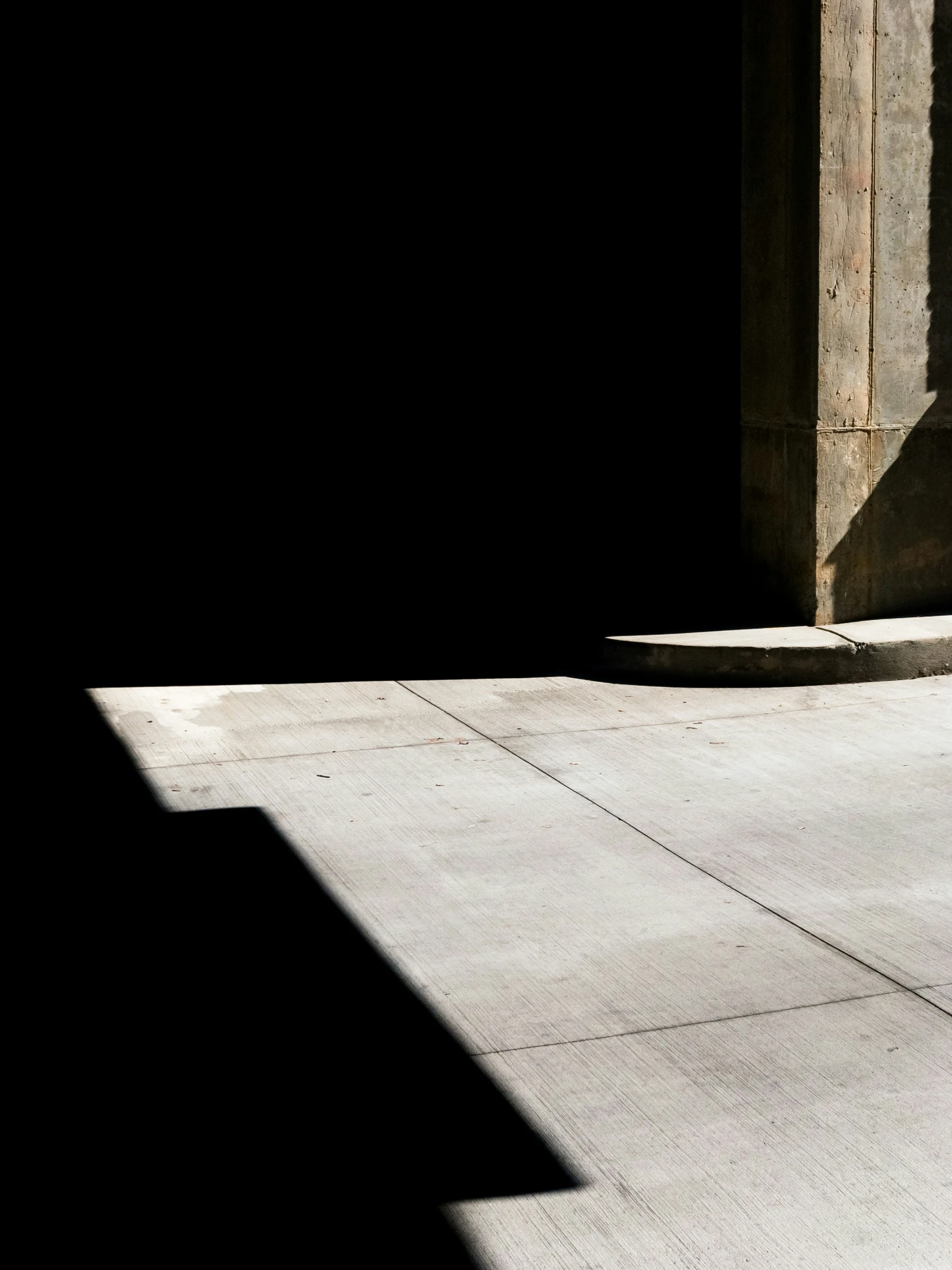 a boy in a suit riding a skateboard