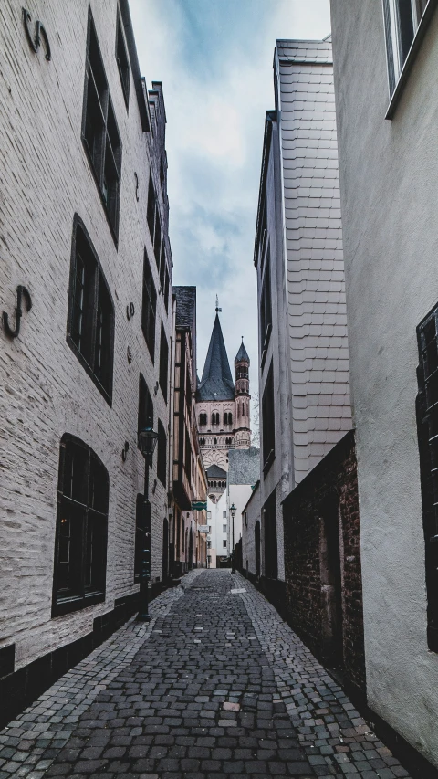 some old buildings with a clock tower at the top