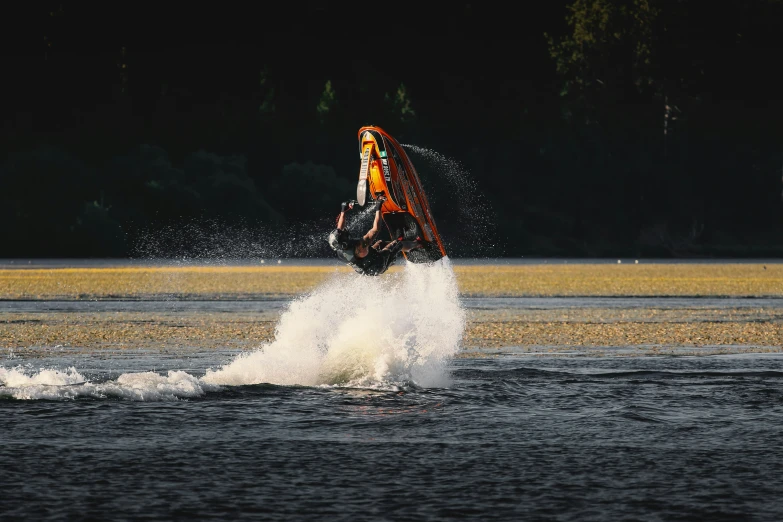 man is on a jet ski in the water