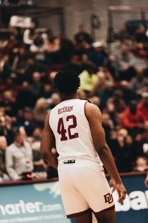 a basketball player in the middle of the court