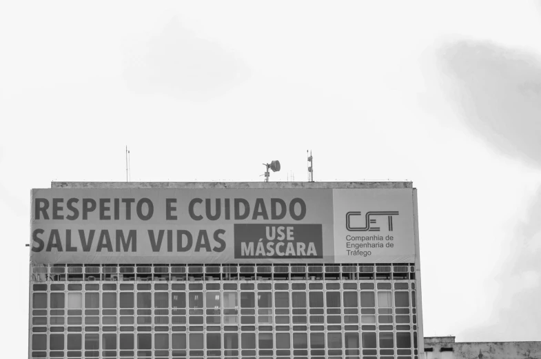 a large building with a sign on top