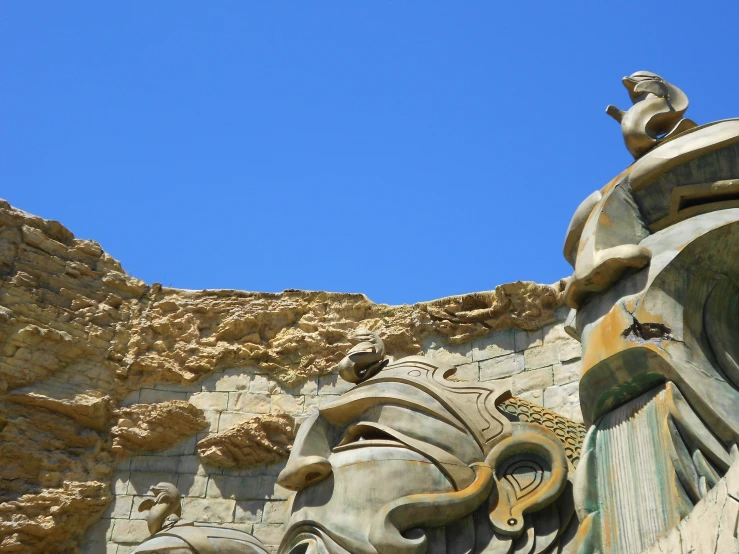 a close up s of a statue that looks like elephants on a mountain