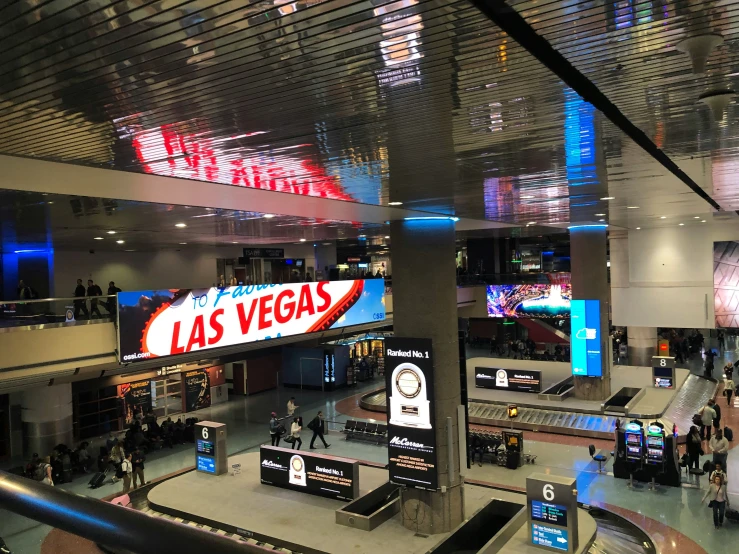 an indoor shopping center, with lights overhead