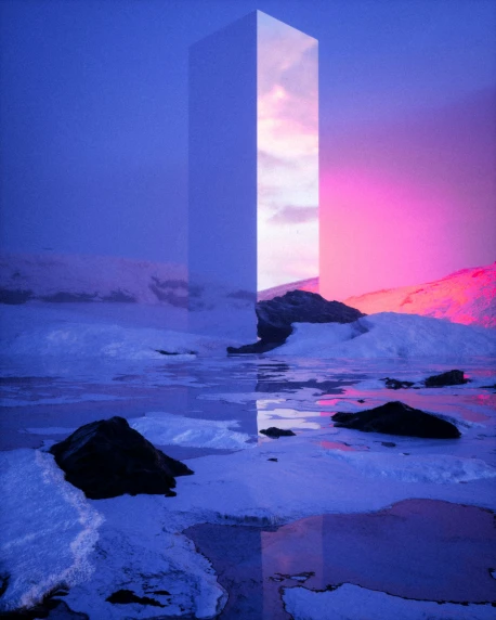 a picture of two windows with an ocean and snow surrounding it