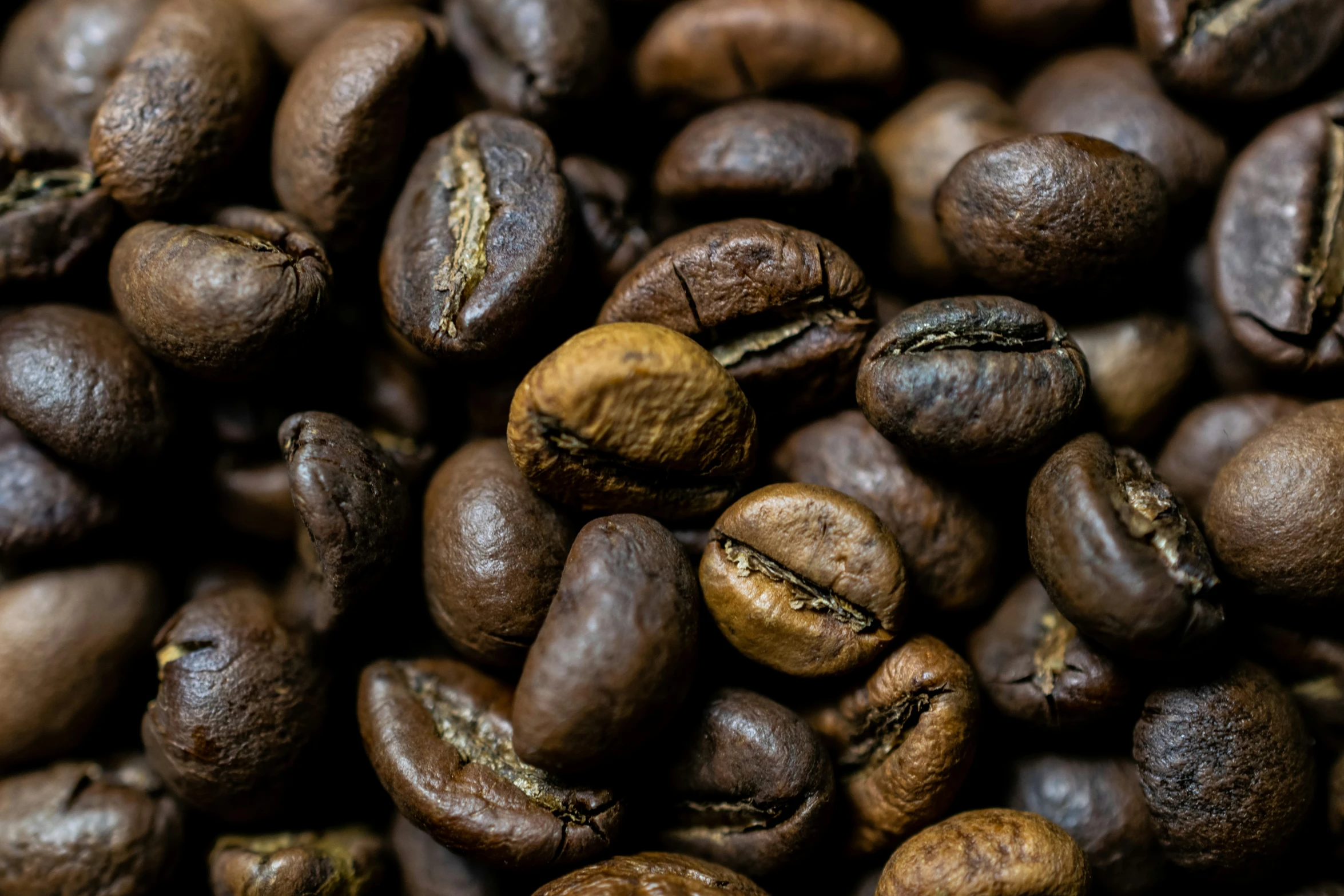 a pile of coffee beans that have been roasted