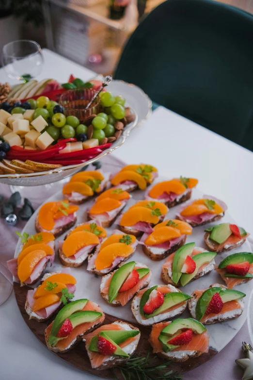 several trays of appetizers that are sitting on a table