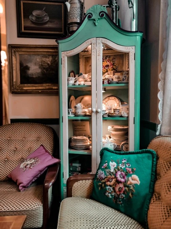 an old china cabinet sits in a room