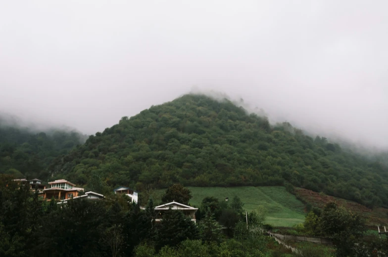 a very tall hill with houses on it