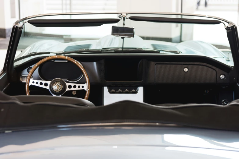 a car with a steering wheel that is black