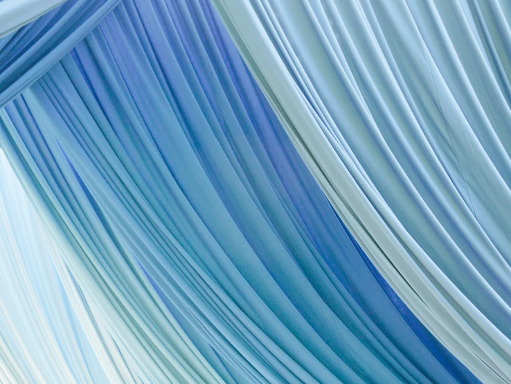 an abstract po of a dd blue curtain