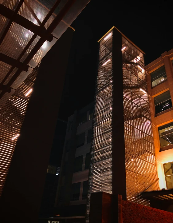 night view of the tower of a building in a city
