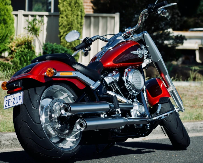 a motorcycle parked on the street with no other car in the background