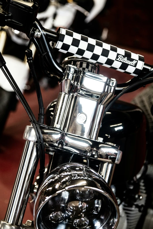 close up of chrome handlebars and steering wheel