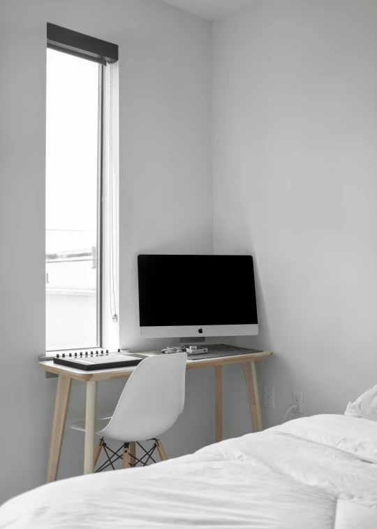 a black and white po of an empty bedroom