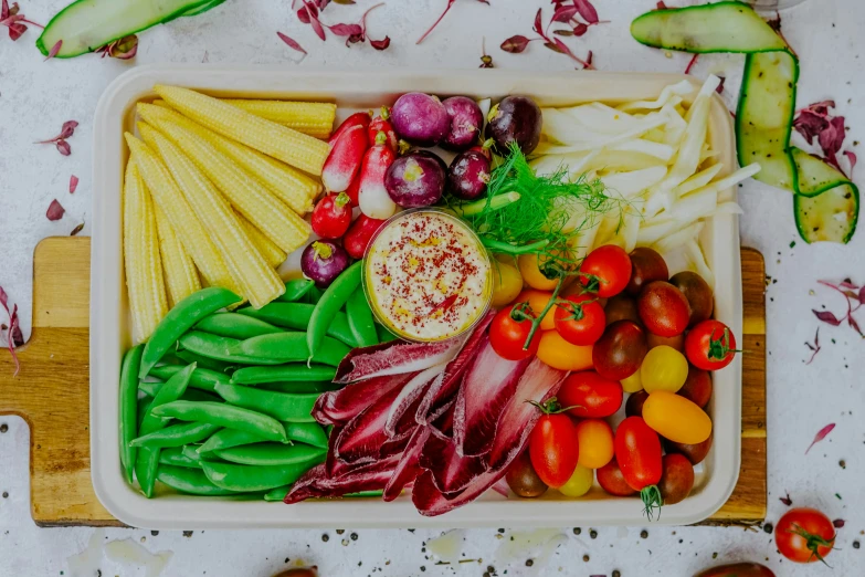 a variety of veggies are arranged together