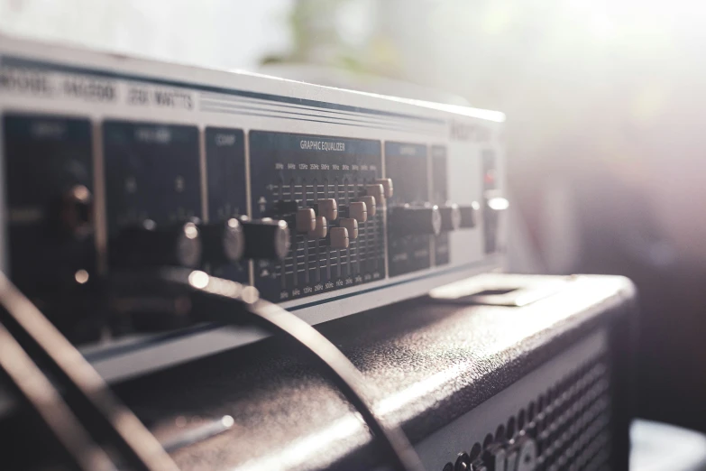 a radio system with the sun shining in a window