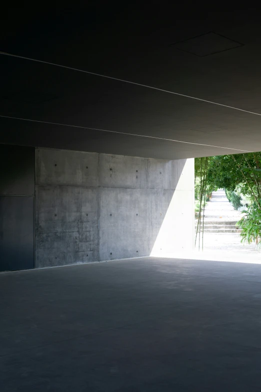 a person riding a skateboard in an empty space