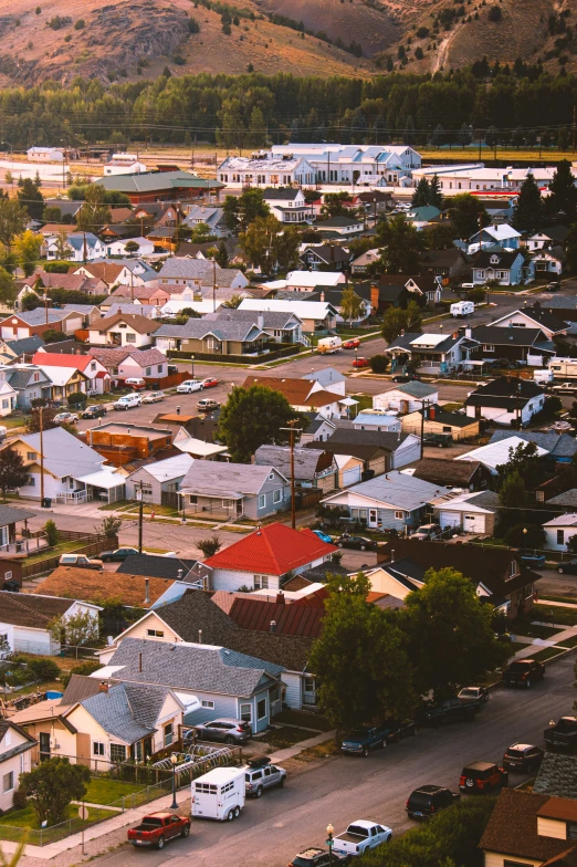 an aerial view of a town with many homes