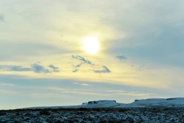 a person riding a horse in the distance