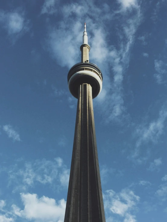 a very tall building with a clock on top