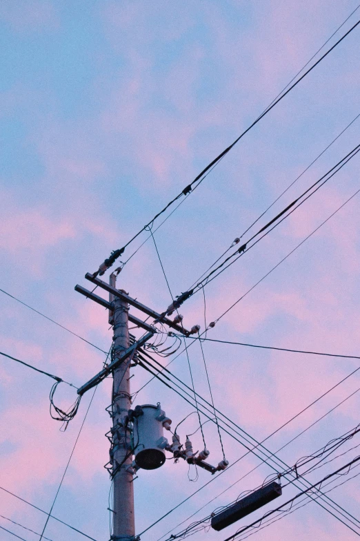 a tower with several power lines on top of it