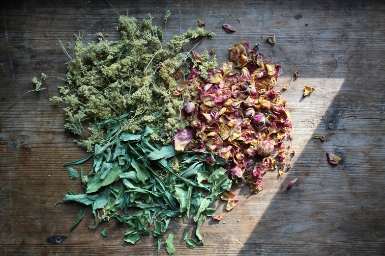 several kinds of dried flowers on a  board