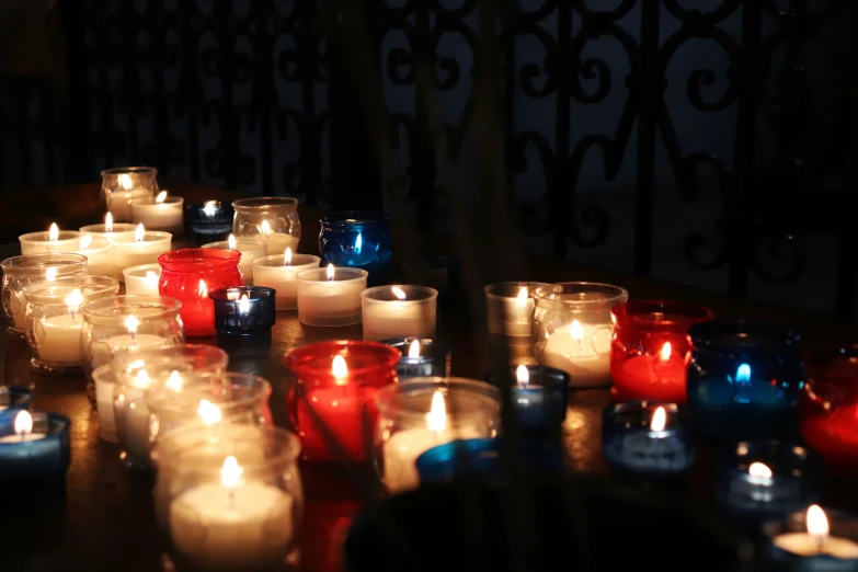 candles lit for christmas displayed on a table