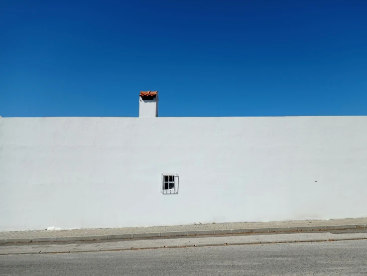 the building is tall and has a window