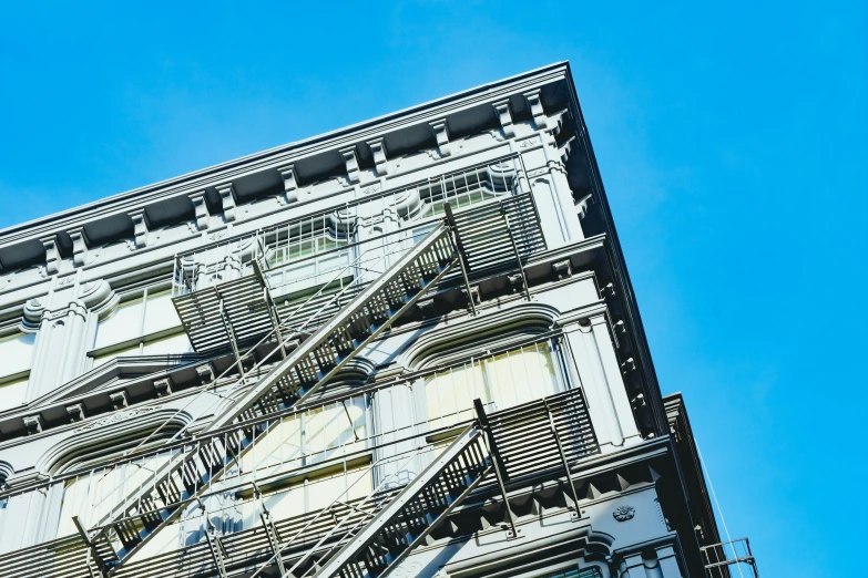 a building with many different buildings and stairs on it