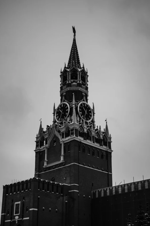 a large building with clocks on each of it's sides