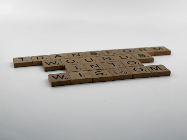 several scrabble tiles spelling word, vision and vision