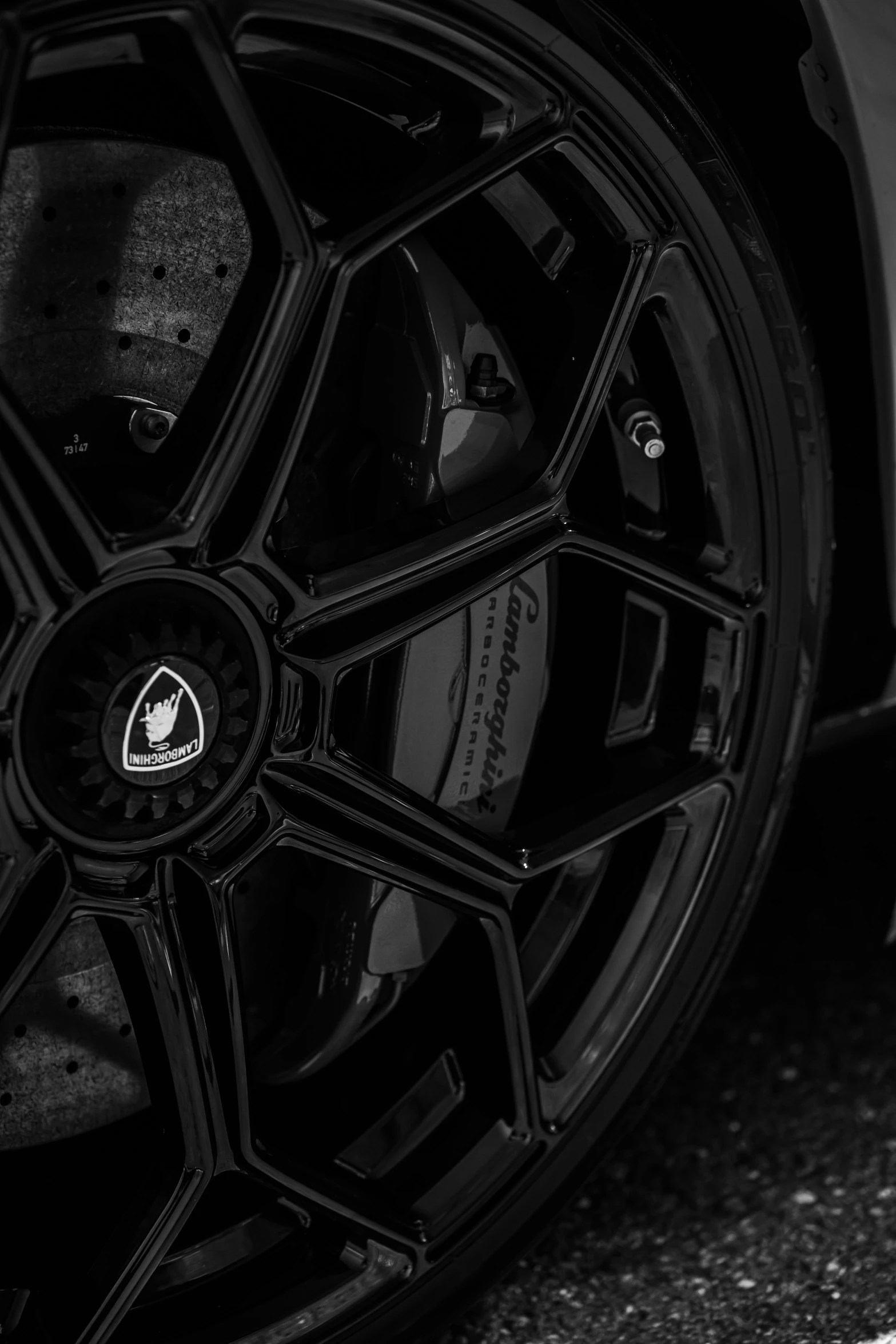 the front wheels of a car in black and white