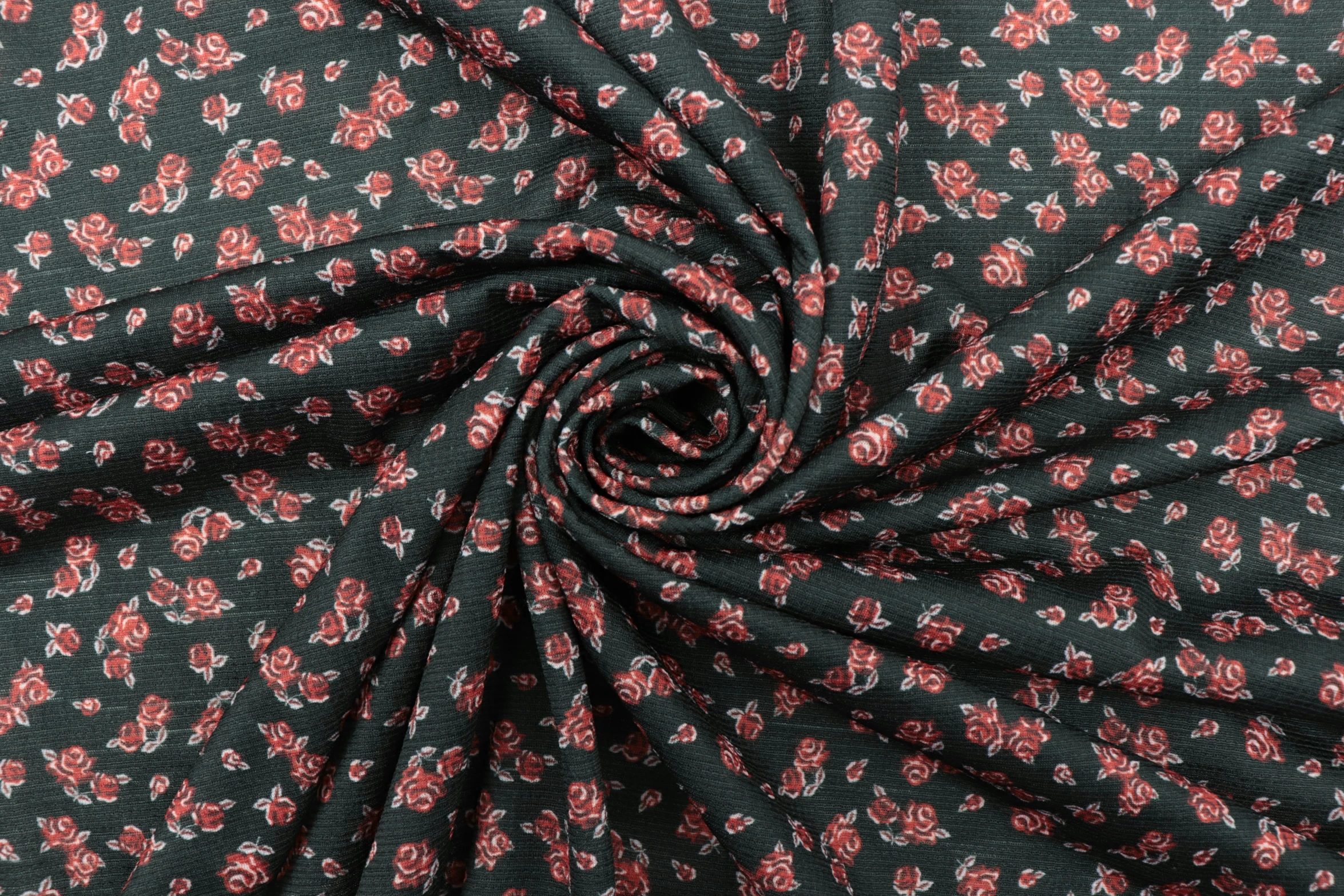 fabric with pink flowers is seen