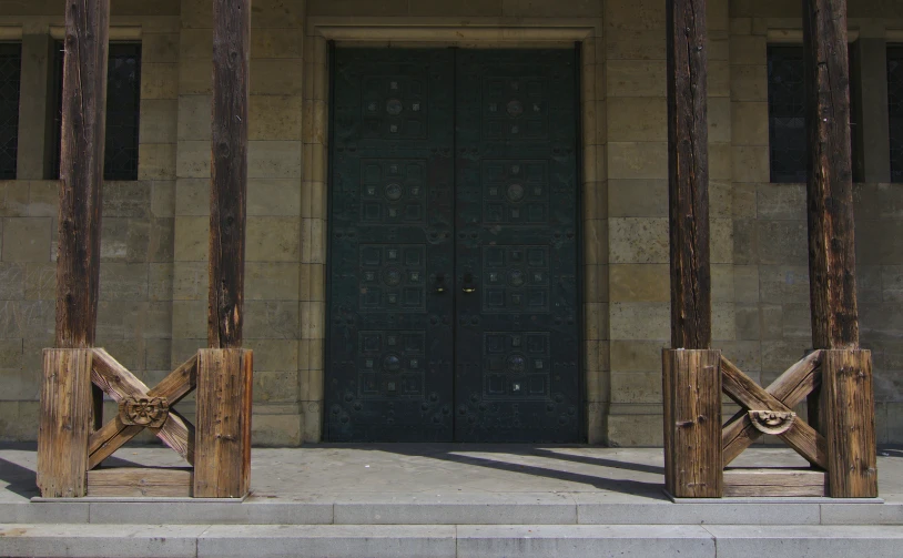 an entrance to a building with a large door