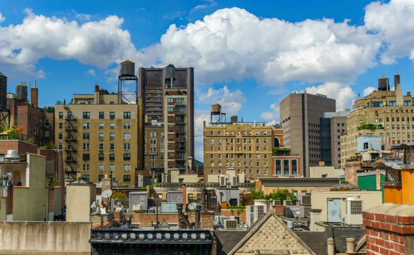 a city with tall buildings and green leaves