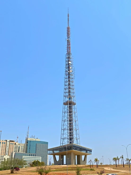 this is a very tall tower with a lot of power lines