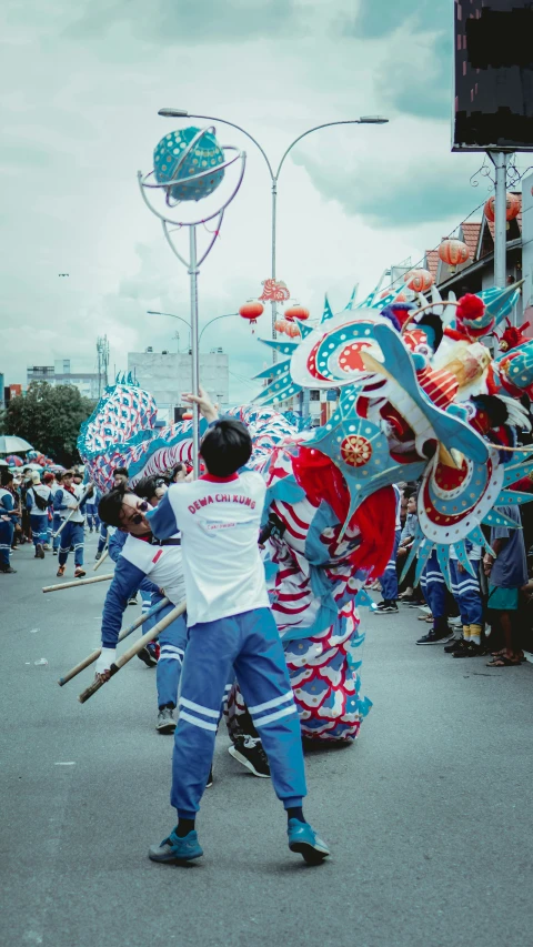 a large group of people are dressed in chinese costume