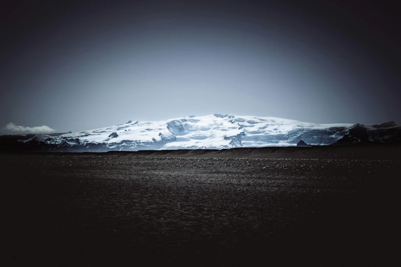 an open view of some mountains and water