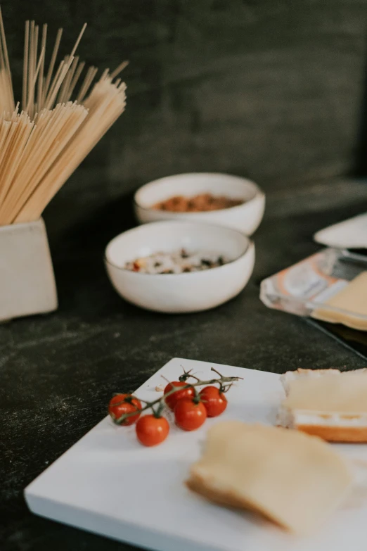 some food that is on a  board