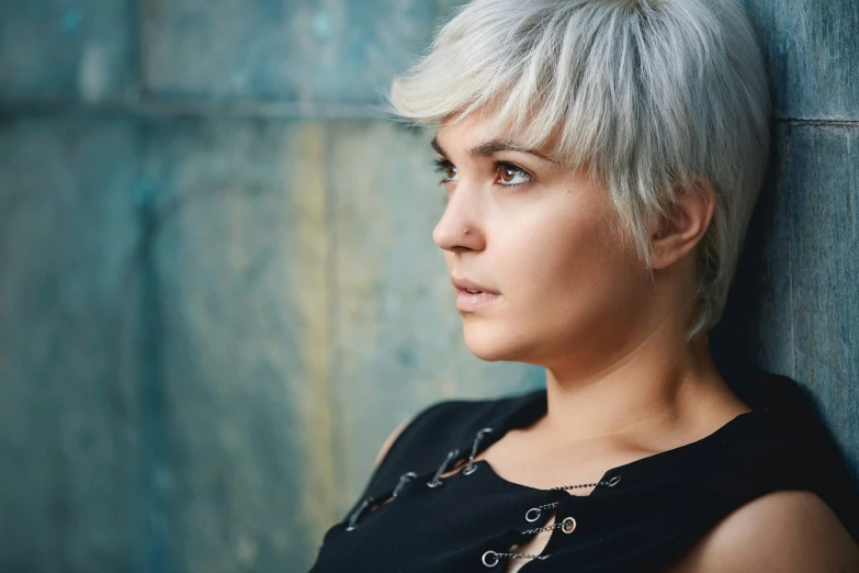 a close up of a person with a shaved hair