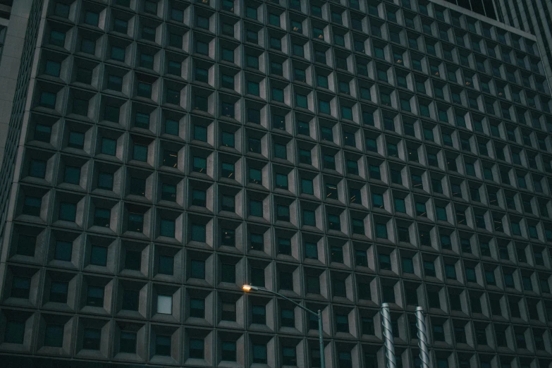the window in the building is reflecting a nearby object